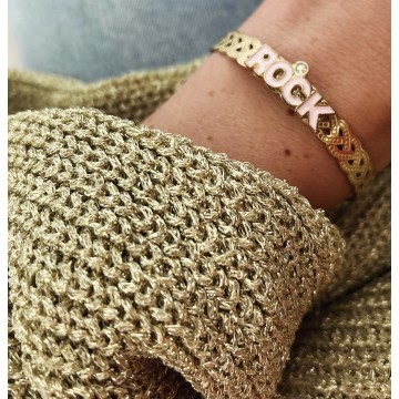 Bracelet rock rose en acier doré.